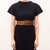 Brown crossbody with buckle clasp.